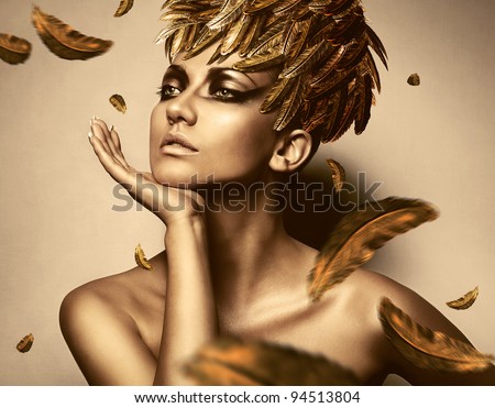 sexy woman in feather gold hat