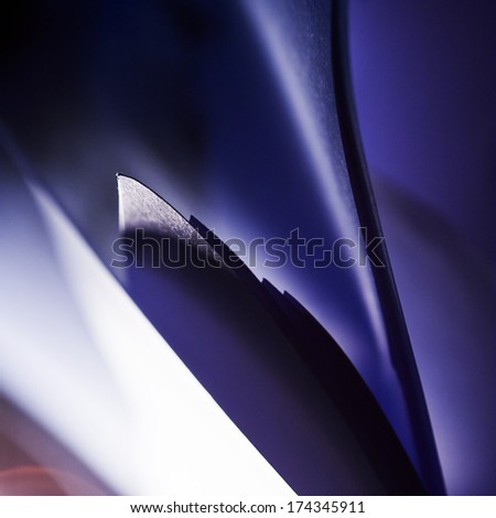 Macro, abstract, background picture of a  blue paper on paper background