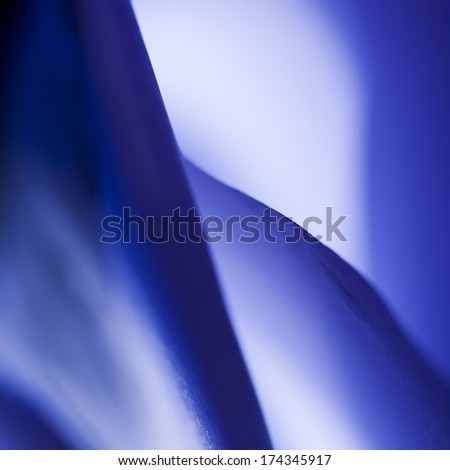 Macro, abstract, background picture of a  blue paper on paper background