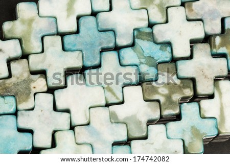 Cross shaped agate with dark background