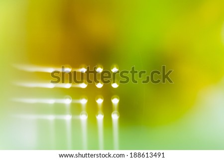Abstract, colorful composition with oil, water and ink with reflected led lights