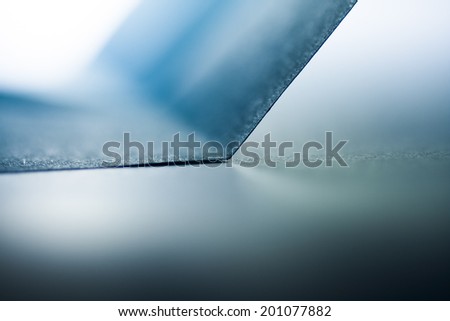 Macro, abstract, background picture of a blue paper on paper background
