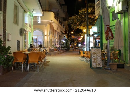 POTOS, THASSOS ISLAND, GREECE - 24 JULY 2014 Street shots in the night with long exposure - causing movement effects