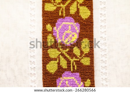 Vintage  textile texture with beautiful, fine embroidery