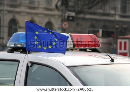 Romanian police car hoisting the EU flag, one day before Romania joined EU