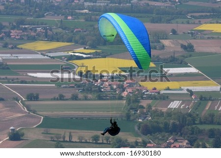 Paraglider above a rural area