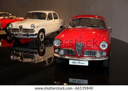 PARIS - OCTOBER 12: The Alfa Romeo vintage collection on display at the 2010 Paris Motor Show on October 12, 2010 in Paris