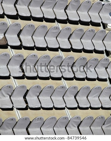 Rows of empty seats in an open-air theater - top view