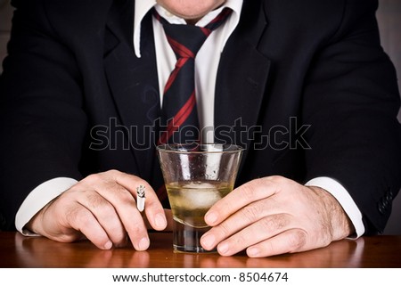 Business man having a drink