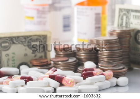 Medication and money piled high, illustrating the increasing cost of health care