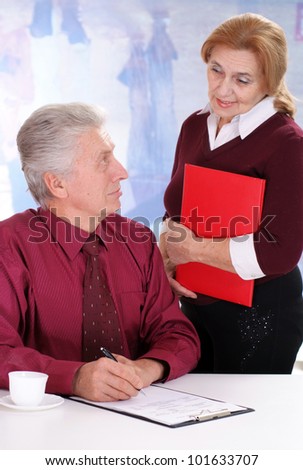 business man with a lady on a light background