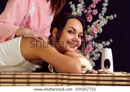 Happy Caucasian woman at a reception in the spa salon