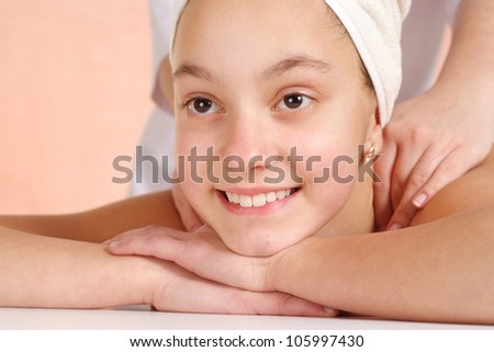 Beautiful girl in spa salon massage at the reception