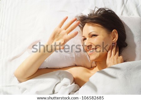 Cute woman is resting at home