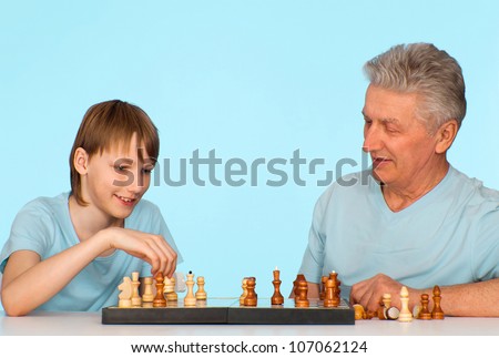 Grandpa has fun leasure with his grandchild