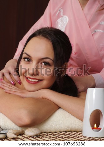 Pretty Caucasian lady at a reception in the spa salon