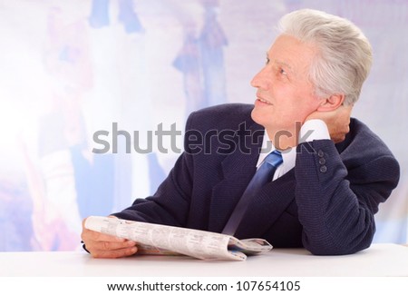 Attractive elderly man, working in very different fields of activity