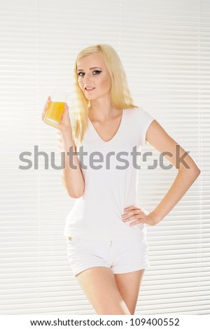 Amusing blonde with a bright appearance in her home