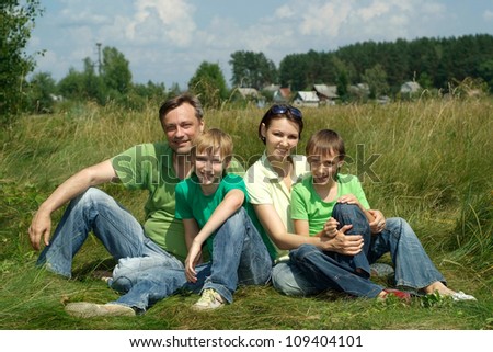 Good family having fun in the company of each other on the nature