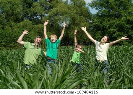 Pleasant family having fun in the company of each other on the nature