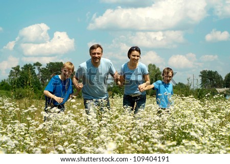 Cool family having fun in the company of each other on the nature