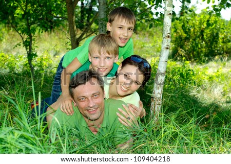 Cool family having fun in the company of each other on the nature