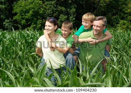 Pleasant family having fun in the company of each other on the nature
