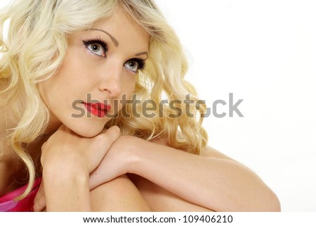 Adorable blonde with a bright appearance on a white background