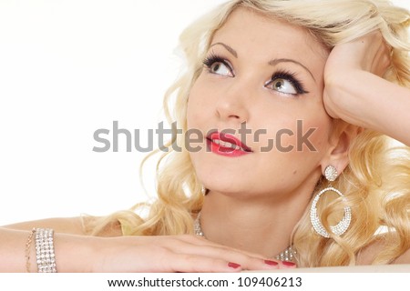 Pleasant blonde with a bright appearance on a white background