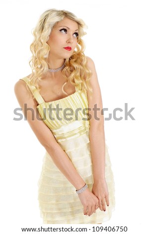 Beauteous blonde with a bright appearance on a white background