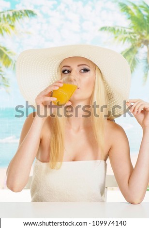 Sympothetic blonde with a bright appearance is resting at a resort