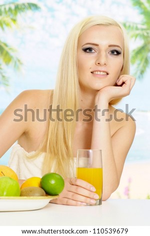 Pleasant blonde with a bright appearance is resting at a resort