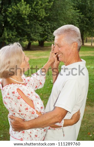 Attractive elderly couple went for a walk together