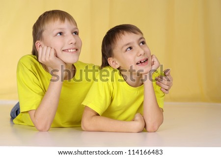 Fun family in yellow t-shirts having a good time together