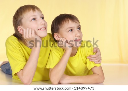 Fun family in yellow t-shirts having a good time together