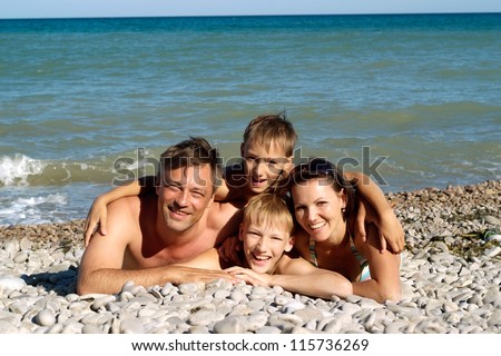 Cheerful family have a great time with each other\'s