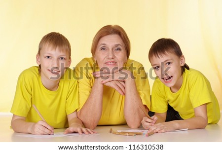 Interesting family in yellow t-shirts having a good time together