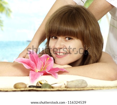 beautiful girl with a bright appearance rests in the spa