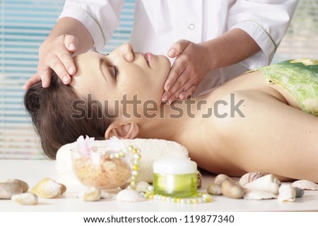 beautiful woman with bright appearance rests in the spa