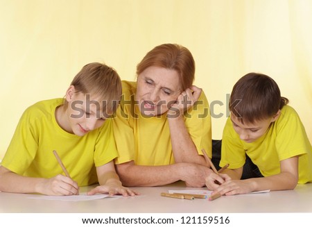 Good family in yellow t-shirts having a good time together