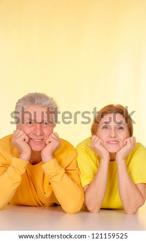 Fine family in yellow t-shirts having a good time together