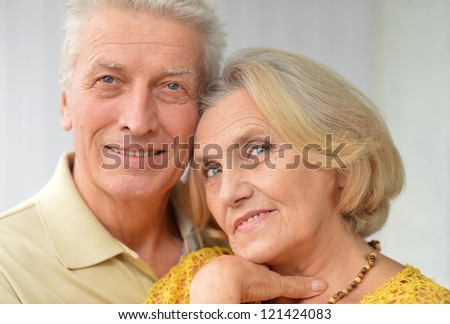 Portrait of a nice elderly couple in the room