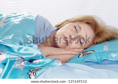 nice older woman sleeping in the room