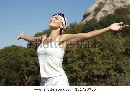 beautiful young woman enjoying outdoor recreation in summer