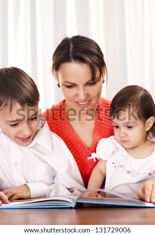 happy mom spend time with her young children
