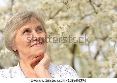 close-up portrait of an elder woman on walk