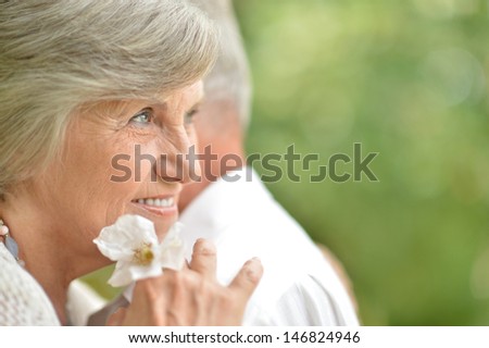 Portrait of an elderly couple in love on the walk