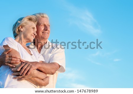 elderly man and an elderly woman resting together