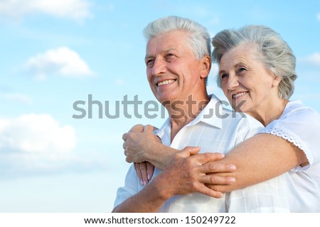 Elderly couple relaxing on a sunny day together