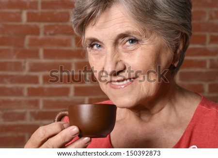 Portrait of an attractive middle-aged woman at home
